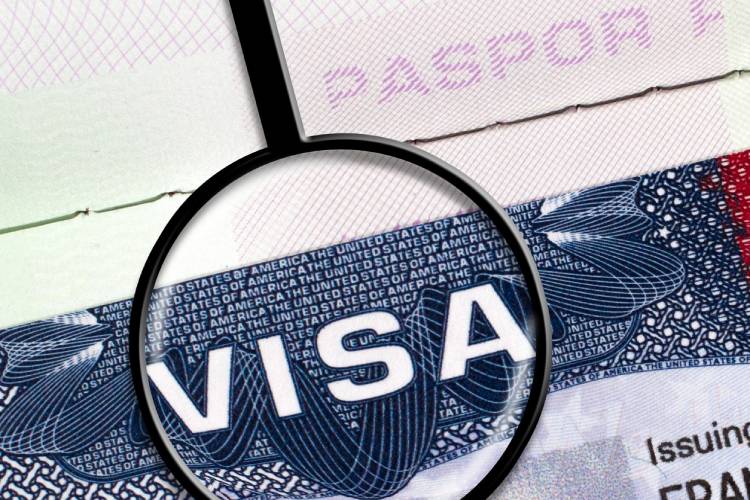 E-Visa After a USCIS Status Change